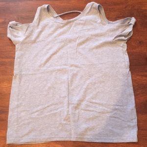 Light blue tee, shoulder cutouts